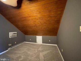 additional living space featuring wooden ceiling, carpet flooring, baseboards, and lofted ceiling