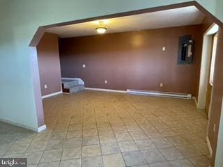 bonus room featuring baseboards