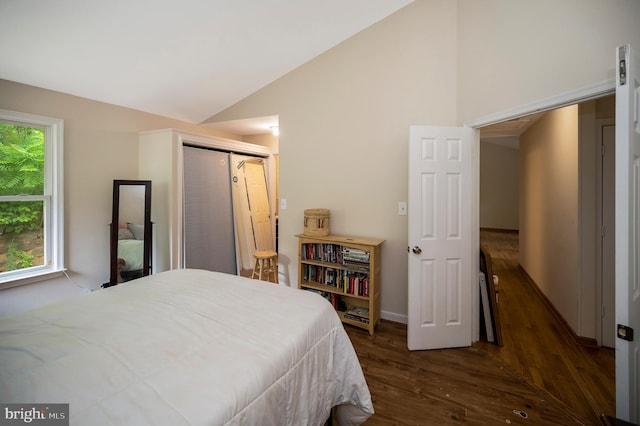 2036 Coast Guard Dr, Stafford, VA 22554 - bedroom with wood finished floors, vaulted ceiling, and baseboards