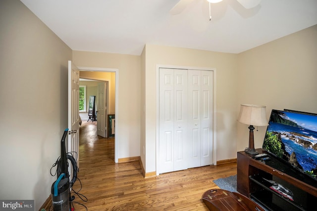 2036 Coast Guard Dr, Stafford, VA 22554 - living area featuring wood finished floors, ceiling fan, and baseboards