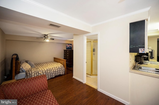 2036 Coast Guard Dr, Stafford, VA 22554 - bedroom with wood finished floors, crown molding, ceiling fan, baseboards, and a sink