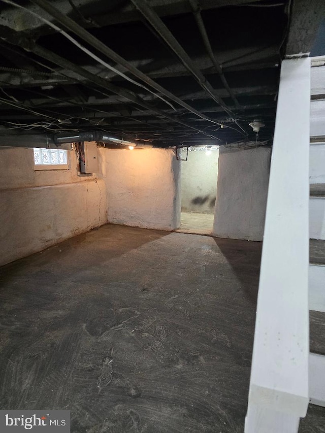 basement with electric panel