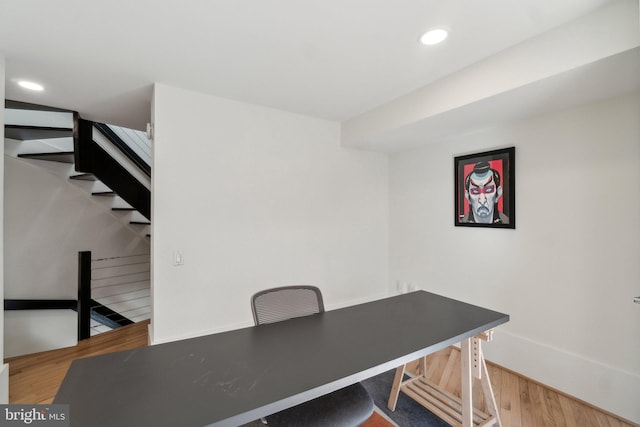 home office with recessed lighting and wood finished floors