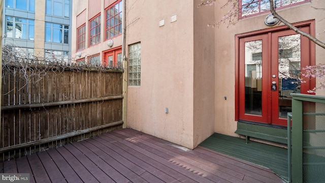 wooden terrace featuring french doors