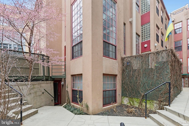 view of building exterior featuring stairway