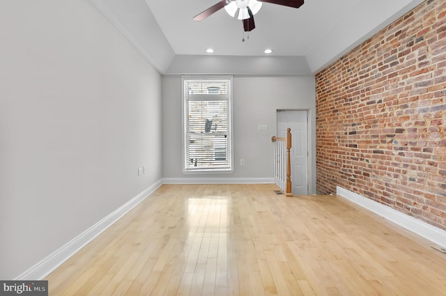 132 N Glover St N, Baltimore, MD 21224 - spare room featuring brick wall, ceiling fan, light wood finished floors, and recessed lighting