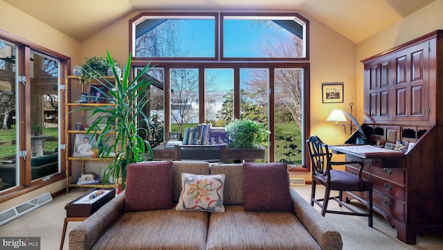 sunroom with visible vents and lofted ceiling