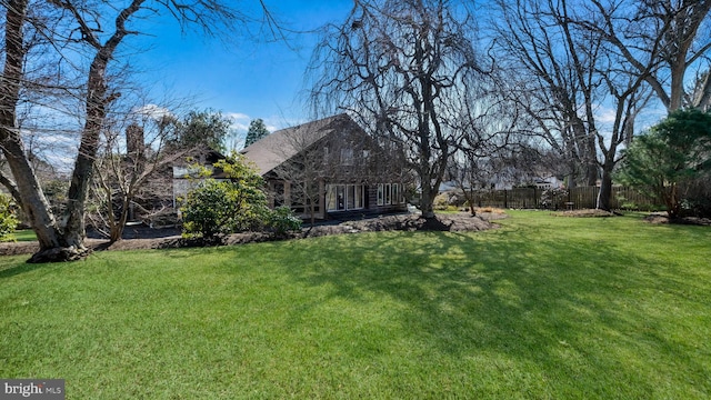 view of yard with fence