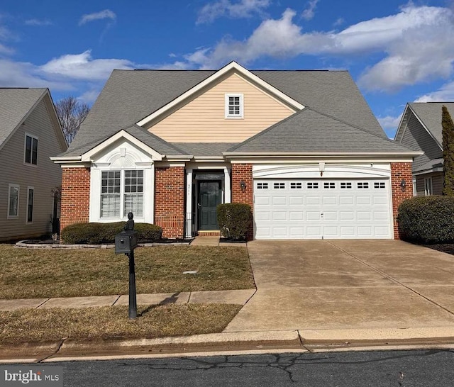 view of front of house featuring brick siding, an attached garage, concrete driveway, and a shingled roof