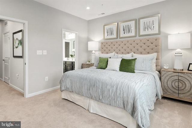 bedroom with visible vents, baseboards, carpet flooring, recessed lighting, and ensuite bathroom