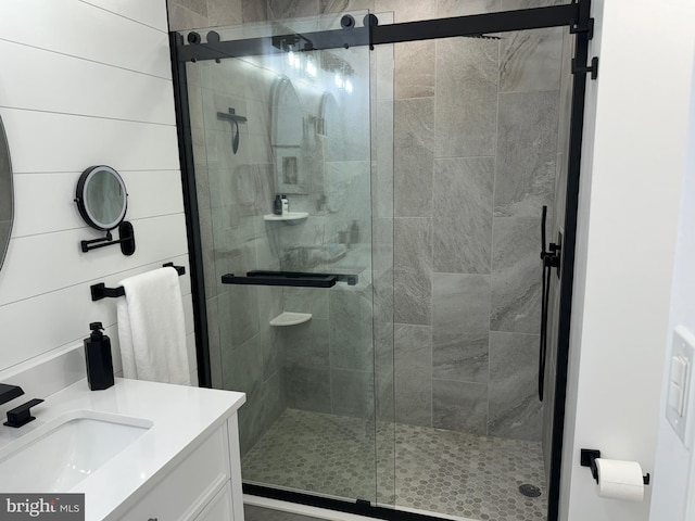 full bath featuring a shower stall and vanity