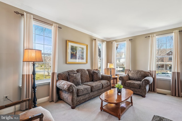 living area featuring crown molding, visible vents, baseboards, and light carpet