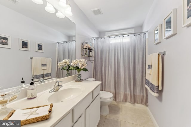 full bath with visible vents, toilet, vanity, and tile patterned flooring