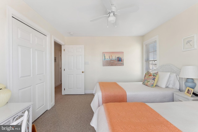 bedroom featuring baseboards, ceiling fan, and carpet flooring