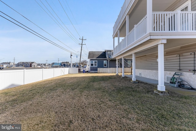 view of yard featuring fence