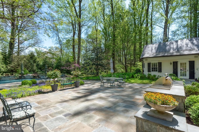 view of patio featuring outdoor dining area