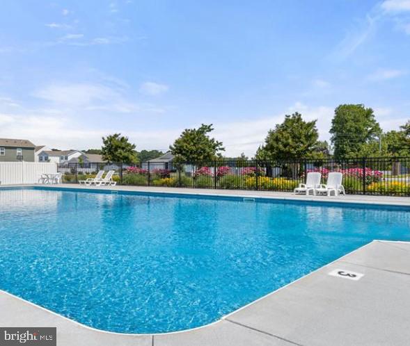 community pool with fence