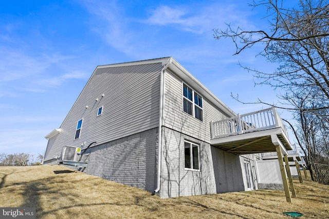 view of property exterior featuring a deck