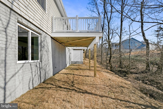 view of yard with an attached carport