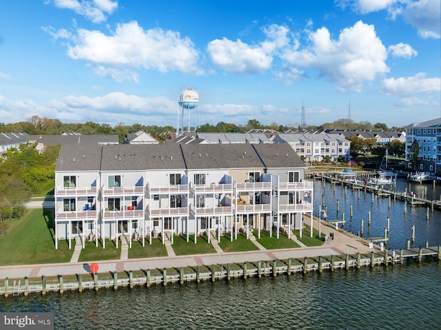 aerial view featuring a water view and a residential view