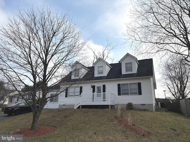 cape cod-style house with a deck, a front lawn, fence, and crawl space