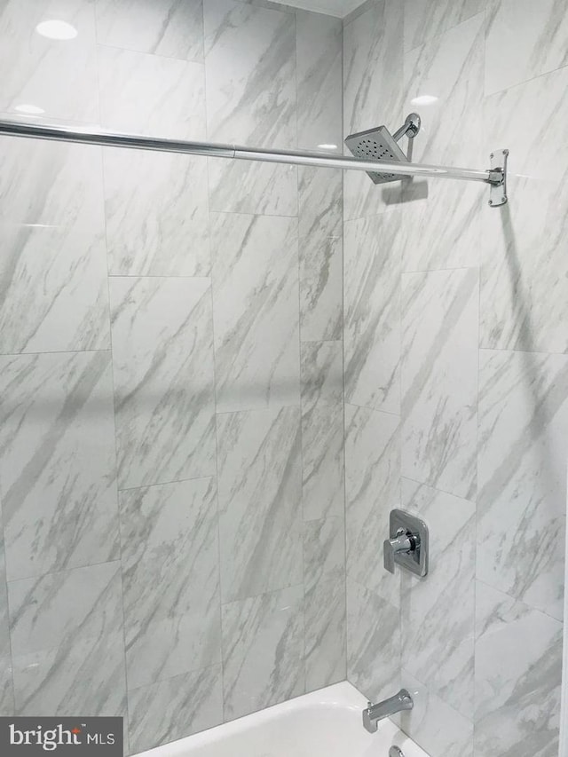 details with shower / bath combination