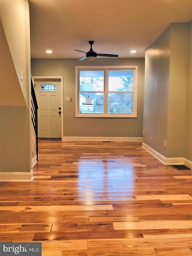 foyer with recessed lighting, baseboards, a ceiling fan, and wood finished floors