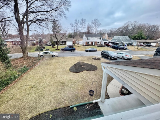 view of yard featuring a residential view