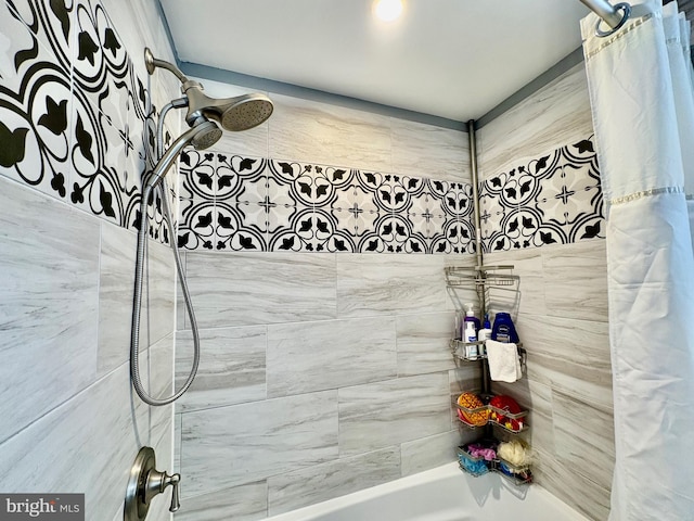 bathroom with shower / bathtub combination with curtain