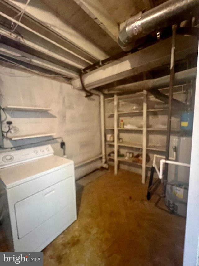 unfinished basement featuring washer / clothes dryer