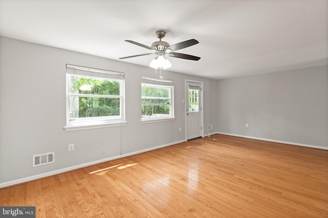 8042 Saint Annes Ct, Alexandria, VA 22309 - empty room featuring light wood finished floors, baseboards, and a ceiling fan