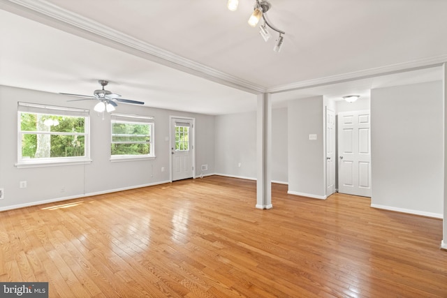 8042 Saint Annes Ct, Alexandria, VA 22309 - unfurnished living room featuring light wood-style flooring, baseboards, ceiling fan, and crown molding