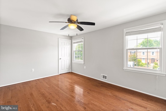 8042 Saint Annes Ct, Alexandria, VA 22309 - empty room with wood finished floors, baseboards, and a ceiling fan