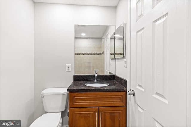 8042 Saint Annes Ct, Alexandria, VA 22309 - full bathroom featuring vanity, toilet, and a tile shower