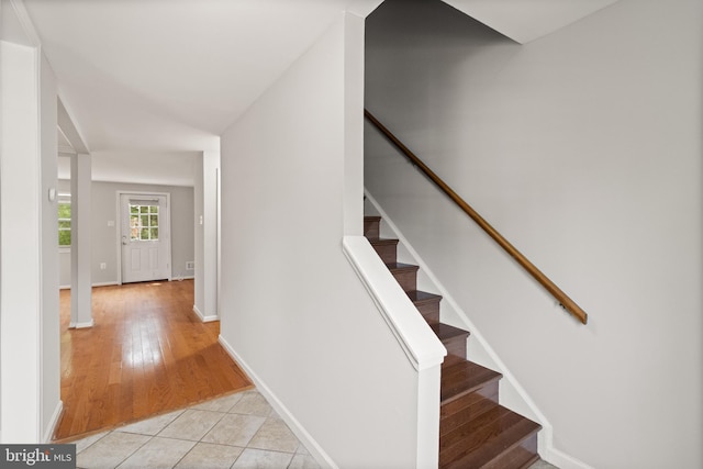 8042 Saint Annes Ct, Alexandria, VA 22309 - staircase featuring baseboards and wood finished floors