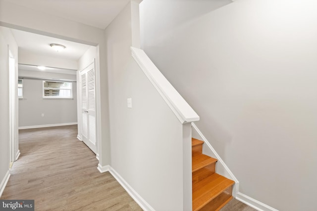 8042 Saint Annes Ct, Alexandria, VA 22309 - staircase featuring wood finished floors and baseboards