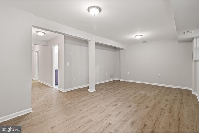 8042 Saint Annes Ct, Alexandria, VA 22309 - finished below grade area featuring light wood-style floors and baseboards