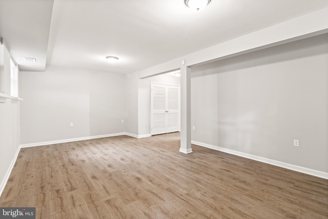 8042 Saint Annes Ct, Alexandria, VA 22309 - finished basement featuring wood finished floors and baseboards