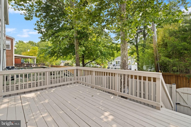 8042 Saint Annes Ct, Alexandria, VA 22309 - wooden deck featuring view of wooded area