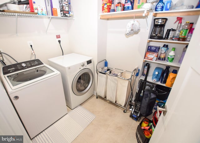 clothes washing area with laundry area and washing machine and dryer