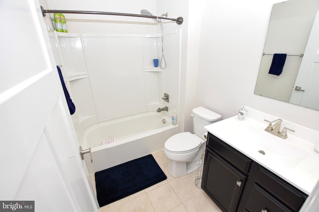 bathroom with vanity, tile patterned floors, toilet, and  shower combination