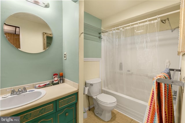 bathroom with tile patterned floors, toilet, vanity, and shower / bath combination with curtain