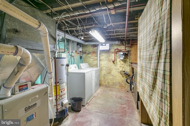 basement with gas water heater and separate washer and dryer