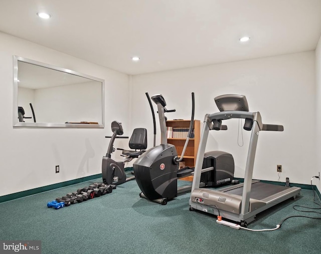 exercise room featuring recessed lighting and baseboards