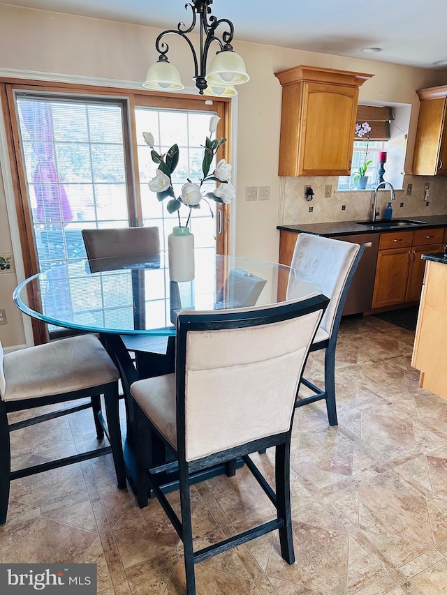 dining area with a chandelier