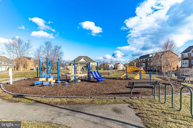 community playground featuring a residential view