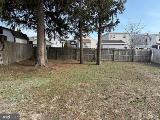 view of yard featuring a fenced backyard