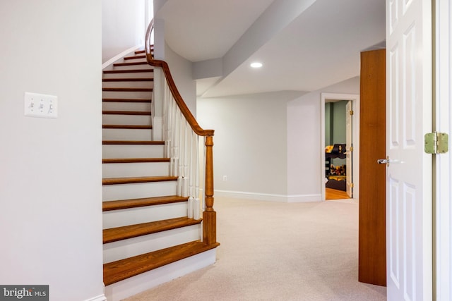 stairs featuring recessed lighting, baseboards, and carpet floors