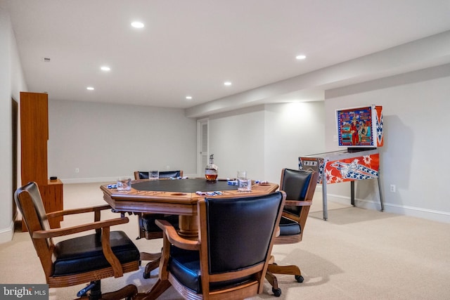 dining room with recessed lighting, carpet, and baseboards