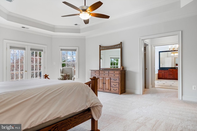 bedroom with crown molding, baseboards, light carpet, a raised ceiling, and access to outside